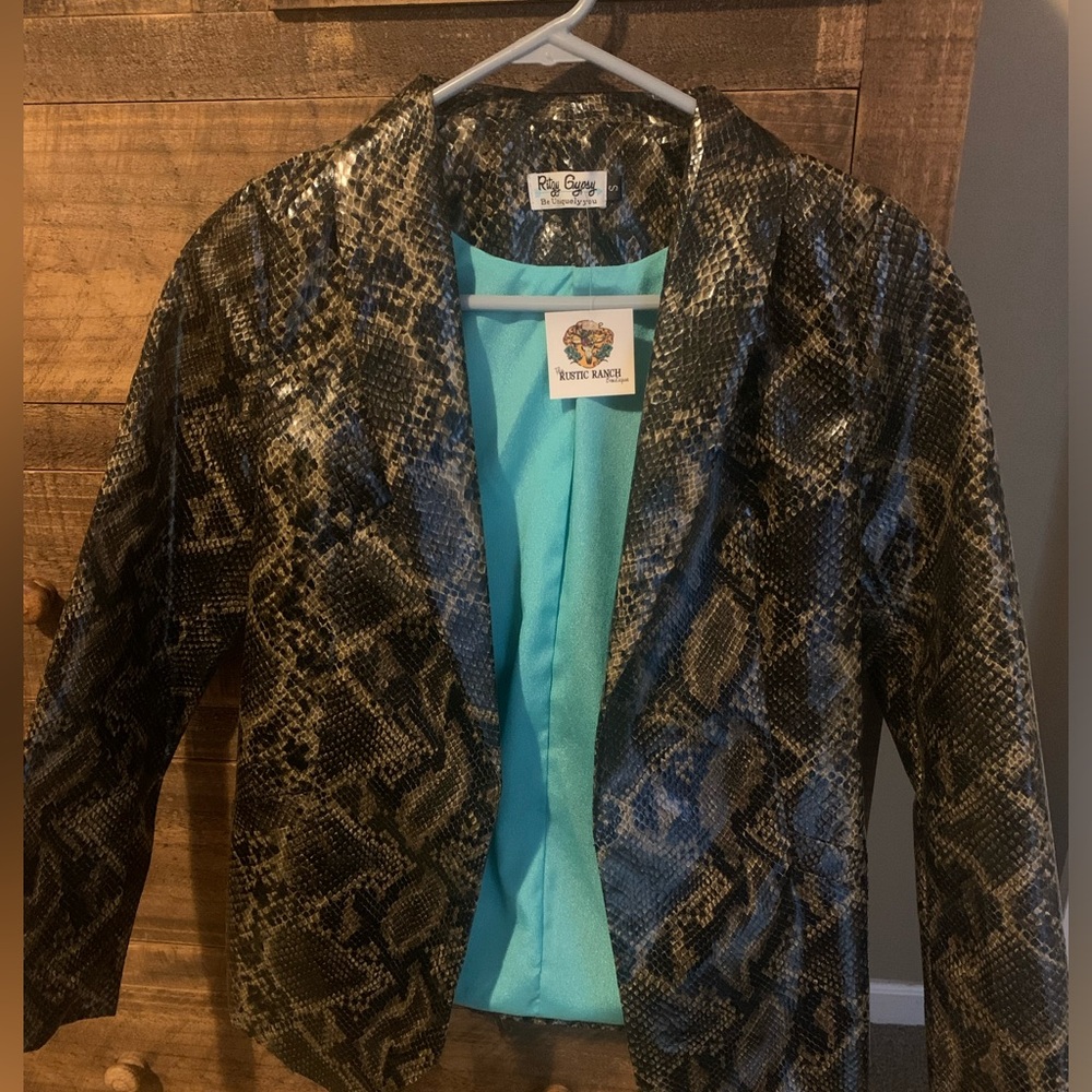 Snake print jacket. NWT. Size small but fits like extra small.